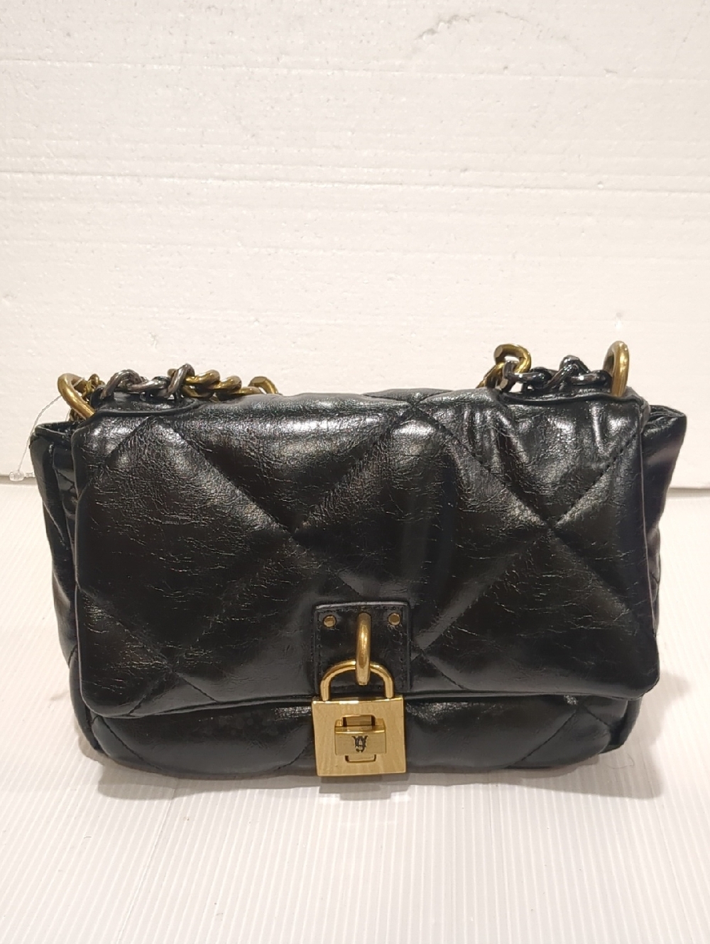 Black Quilted Leather Crossbody Bag with Gold Padlock